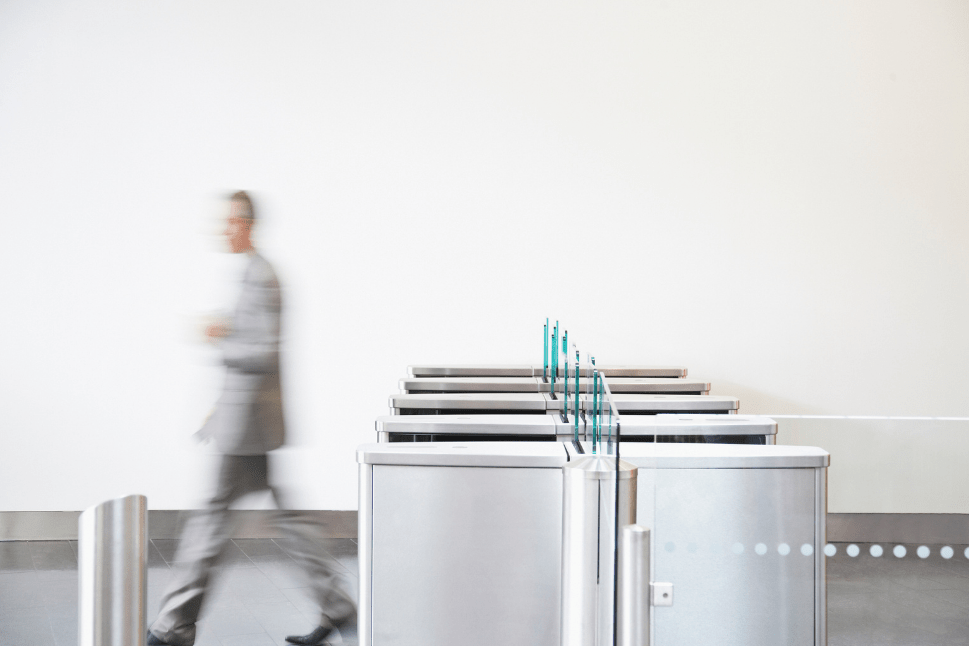 Office Worker Enters Through Security Gate